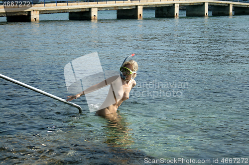 Image of Naked woman on the nudist beach