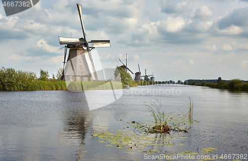 Image of Windmill beside a canal