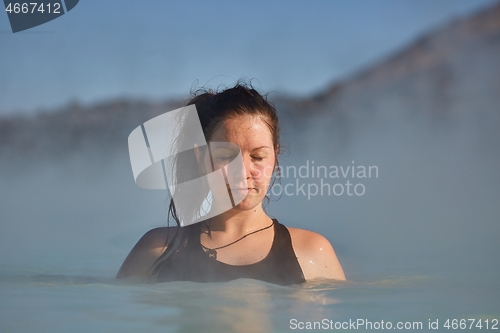 Image of Woman enjoying hot spring spa