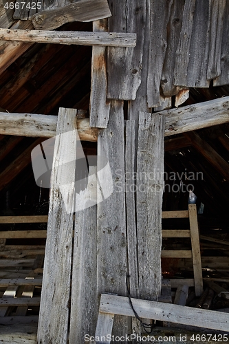 Image of Abandoned house roof and attic damaged