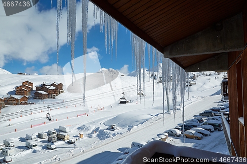 Image of Icicles on the balcony, snowy winter view