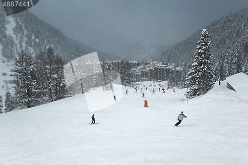 Image of Skiing slopes snowing