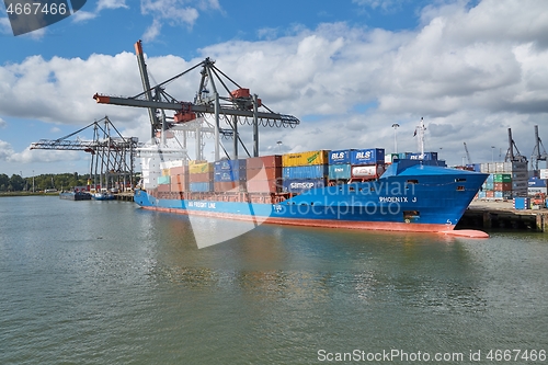 Image of Loading containers on a ship