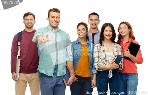 Image of group of students with books and school bags