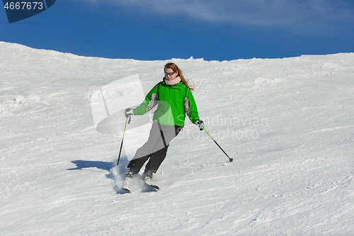 Image of Skiing in the winter snowy slopes