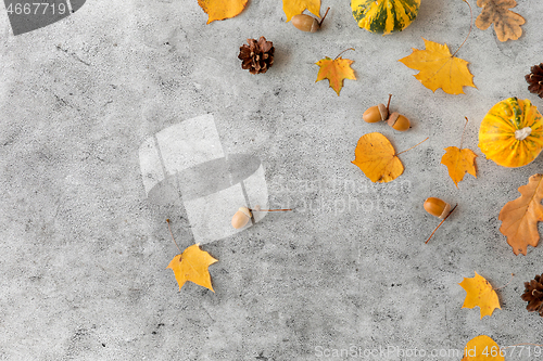 Image of autumn leaves, chestnuts, acorns and pumpkins