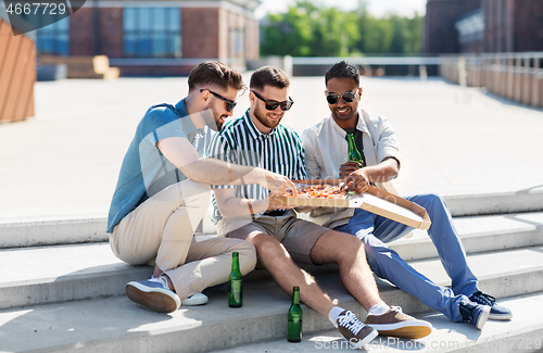 Image of male friends eating pizza with beer on street