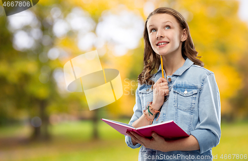 Image of teenage student girl with diary or notebook