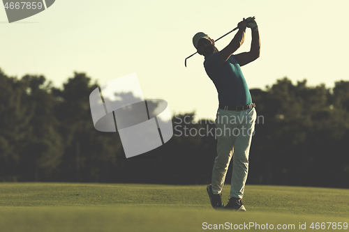 Image of golfer hitting long shot