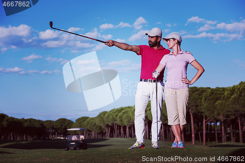 Image of portrait of couple on golf course