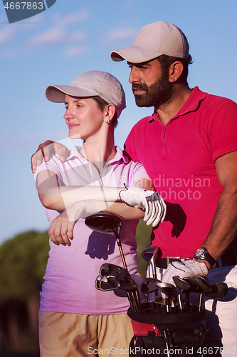 Image of portrait of couple on golf course