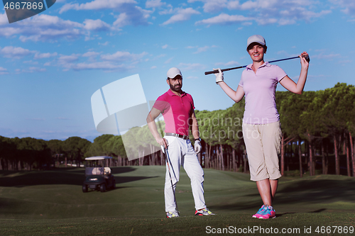 Image of portrait of couple on golf course