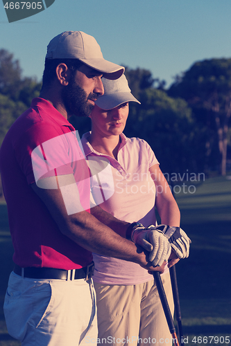 Image of portrait of couple on golf course