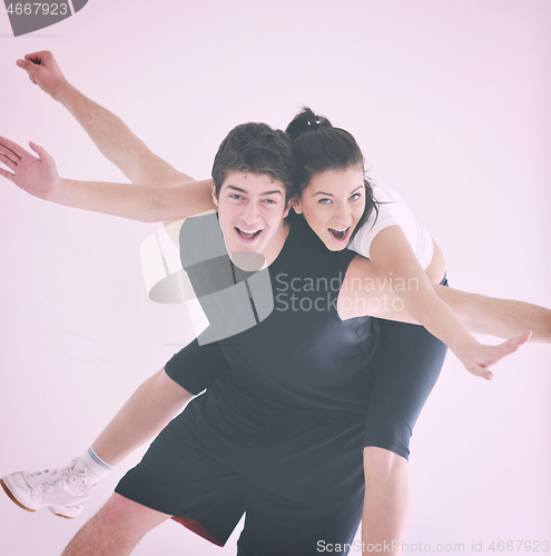 Image of happy young couple fitness workout and fun