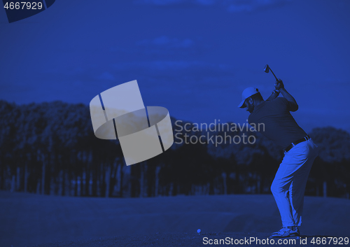 Image of golf player hitting long shot