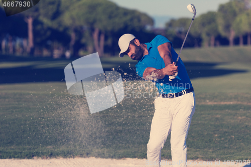 Image of pro golfer hitting a sand bunker shot