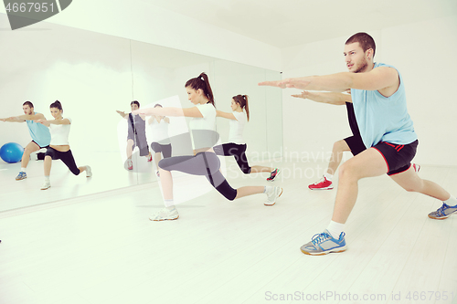 Image of young people group in fitness club