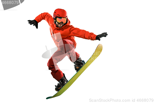 Image of Portrait of young man in sportswear with snowboard isolated on a white background.