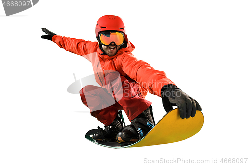 Image of Portrait of young man in sportswear with snowboard isolated on a white background.