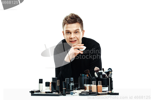 Image of Professional makeup artist isolated on white