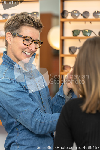 Image of woman in a eyewear store