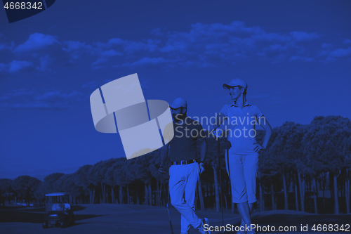 Image of portrait of couple on golf course