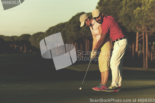 Image of golf instructions