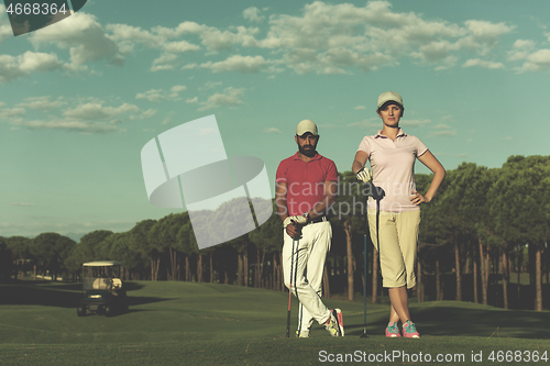 Image of portrait of couple on golf course