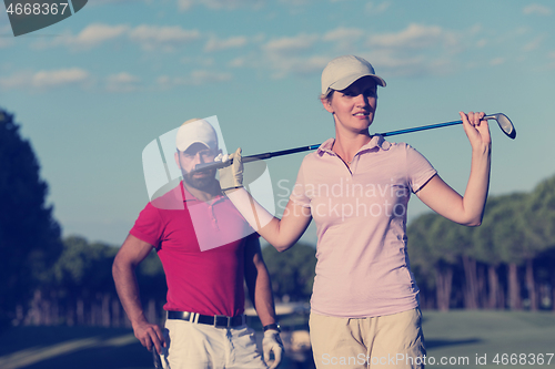 Image of portrait of couple on golf course