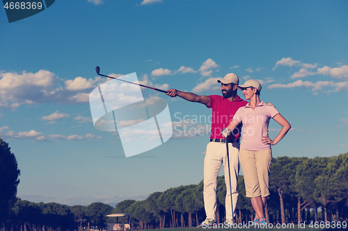 Image of portrait of couple on golf course