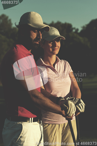 Image of portrait of couple on golf course