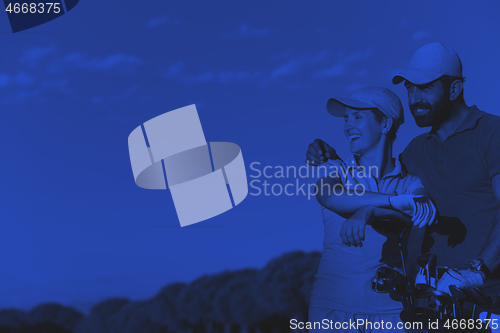 Image of portrait of couple on golf course