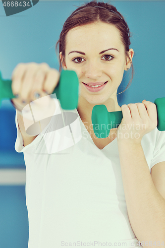 Image of young woman fitness workout 