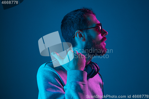 Image of Enjoying his favorite music.