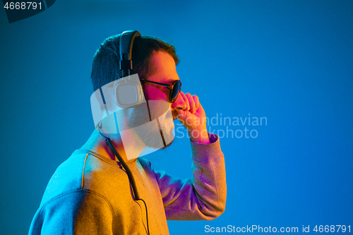 Image of Enjoying his favorite music.