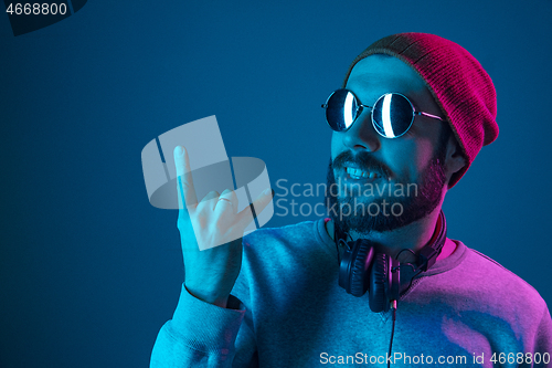 Image of Enjoying his favorite music.