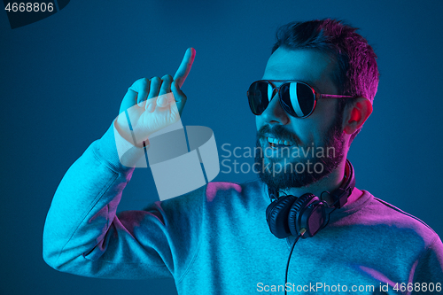 Image of Enjoying his favorite music.