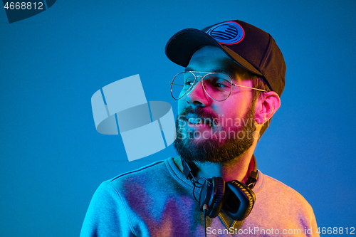 Image of Enjoying his favorite music.