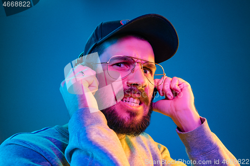 Image of Enjoying his favorite music.