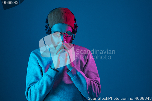 Image of Enjoying his favorite music.