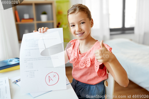 Image of student girl with school test good mark at home