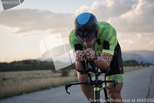 Image of triathlon athlete riding a bike