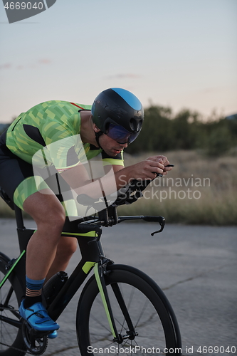 Image of triathlon athlete riding a bike