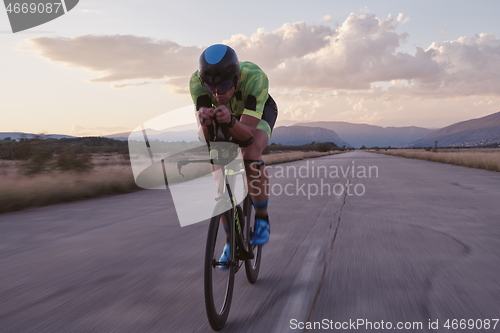 Image of triathlon athlete riding a bike