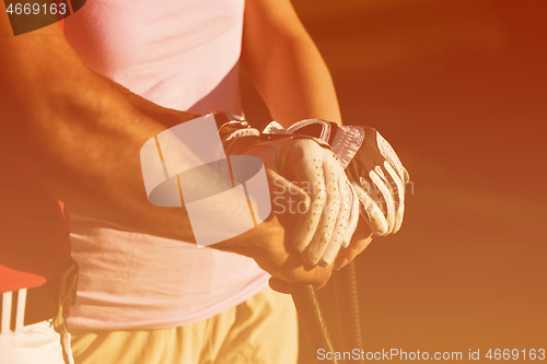 Image of portrait of couple on golf course