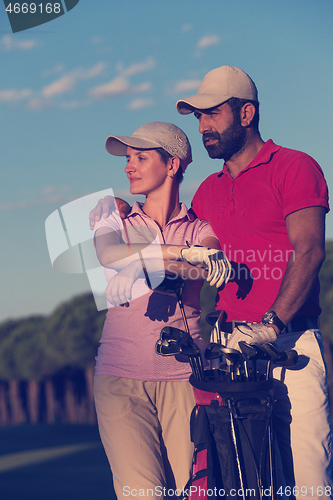 Image of portrait of couple on golf course