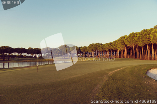 Image of golf course on sunset