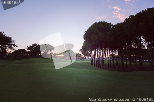 Image of golf course on sunset