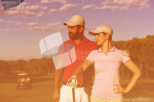 Image of portrait of couple on golf course