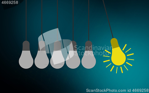 Image of Light bulbs and perpetual motion, creativity concept